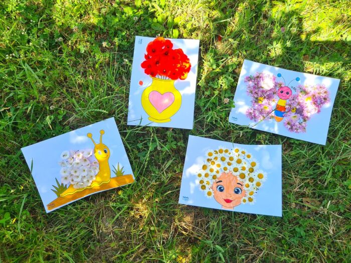 Les quatre tableaux floraux terminés posés dans l'herbe : vase de coquelicots, papillon, escargot et fillette en fleurs